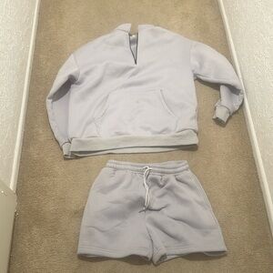 Women’s large pullover and shorts